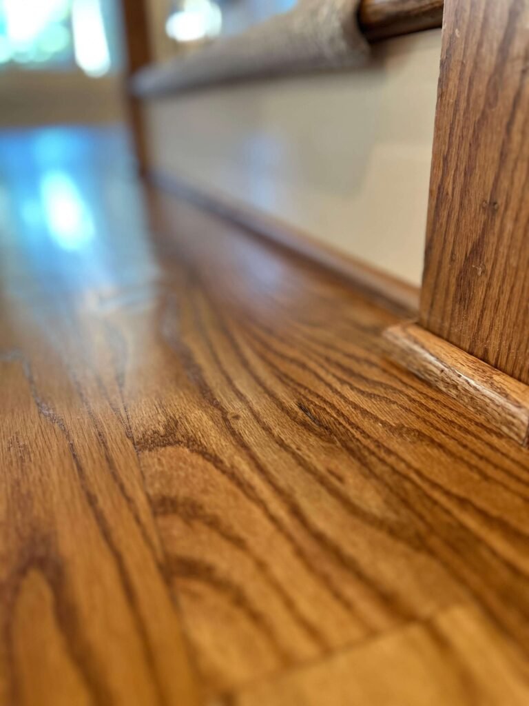 Finished wood flooring in a bright room