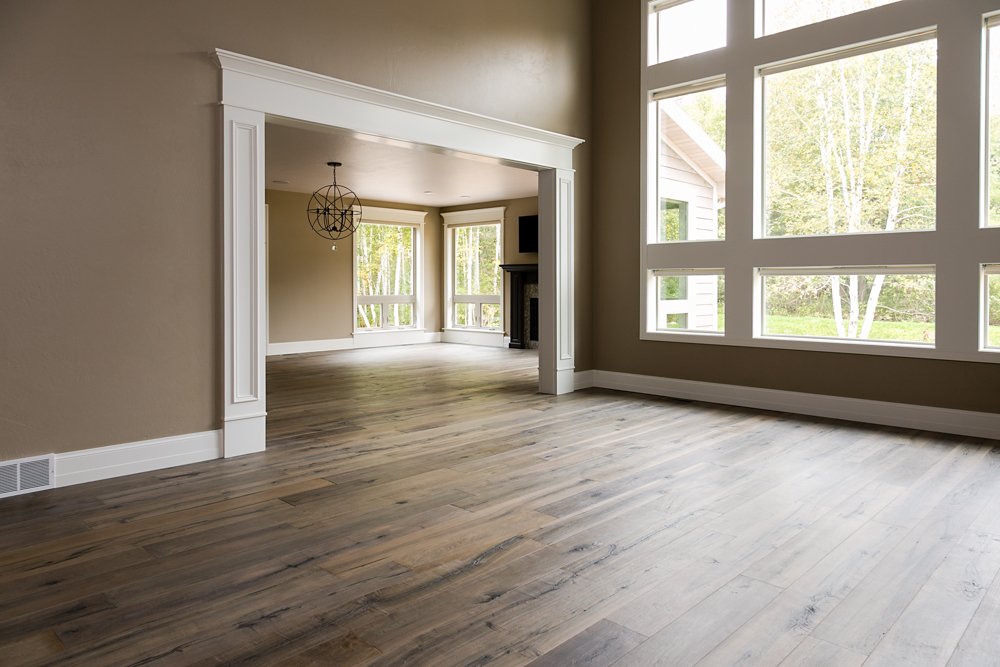 Bright living space with wide wood floor boards