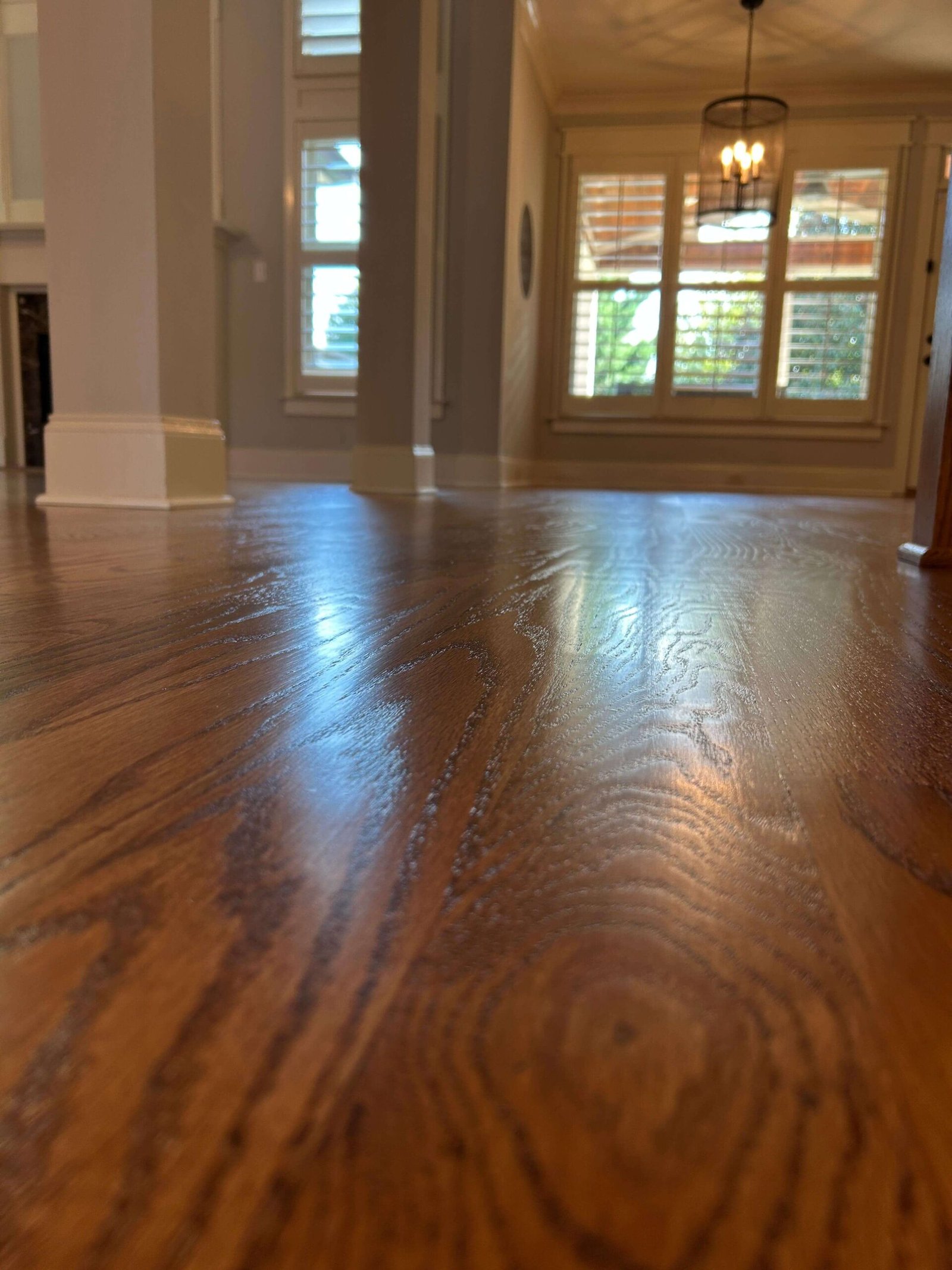 Warm brown wood floor with visible grain